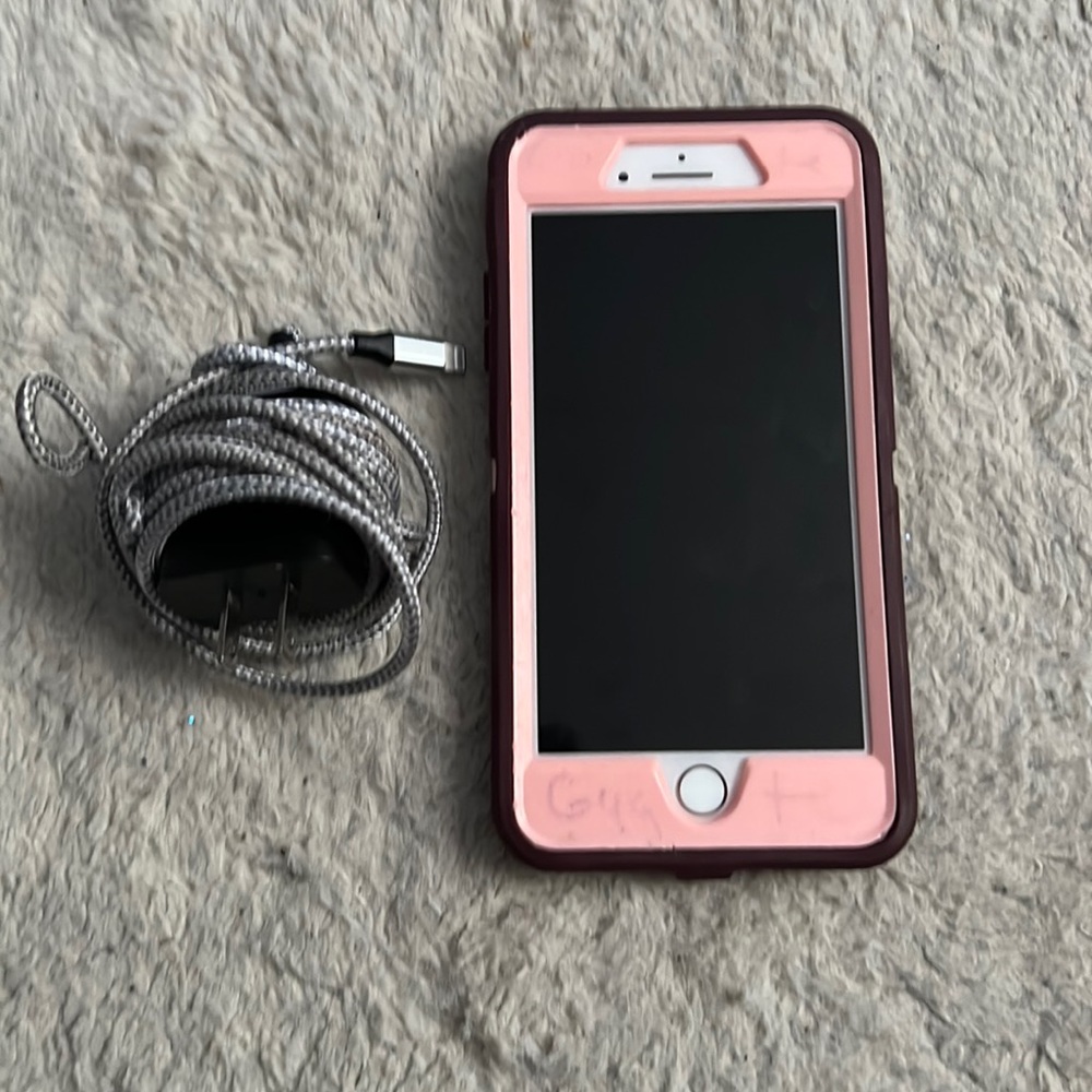 iPhone that comes with the sims and the charger and phone case